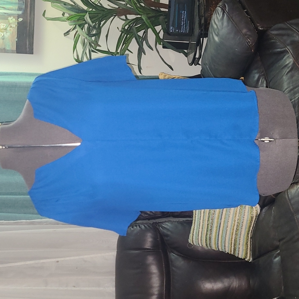 Medium blue light weight weights top. Super cute nice V neckline